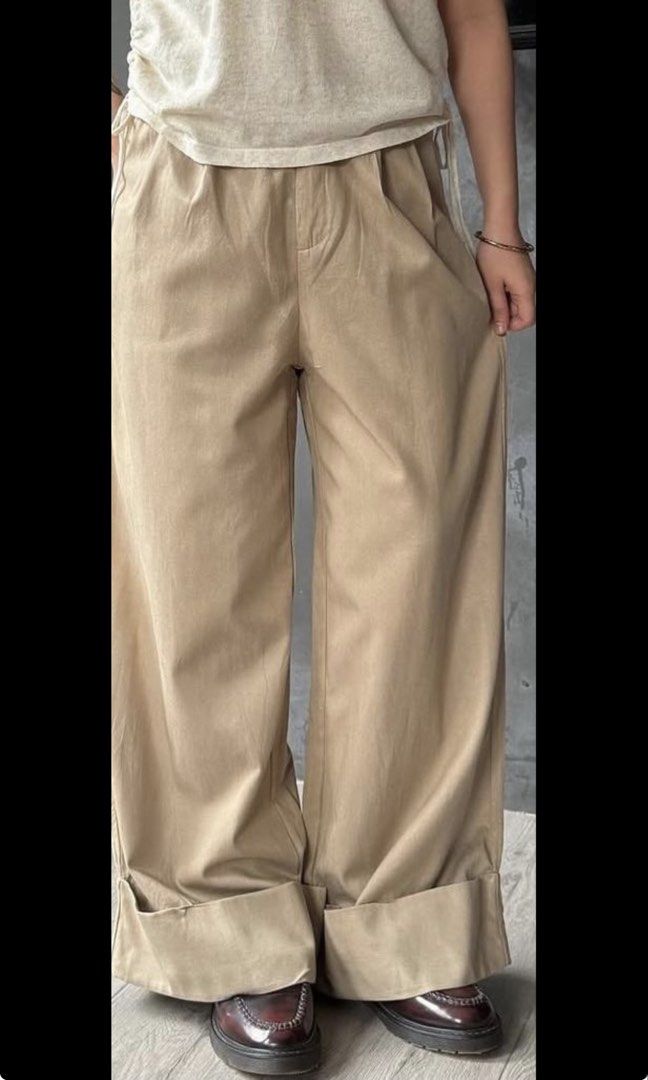 Khaki Wideleg Canvas Pants Cuffed Hem (Category: Other Bottoms) located in Tayug. Submitted by deklutter_ (Listing ID 1460057357, Image 3). Description: When worn sample uploaded Ganda irl, cotton canvas is the fabric Gartered back Waist 26-29 inches Length 38.5 in No issues ‼️Pls haggle responsibly. All items are priced according to their overall condition..