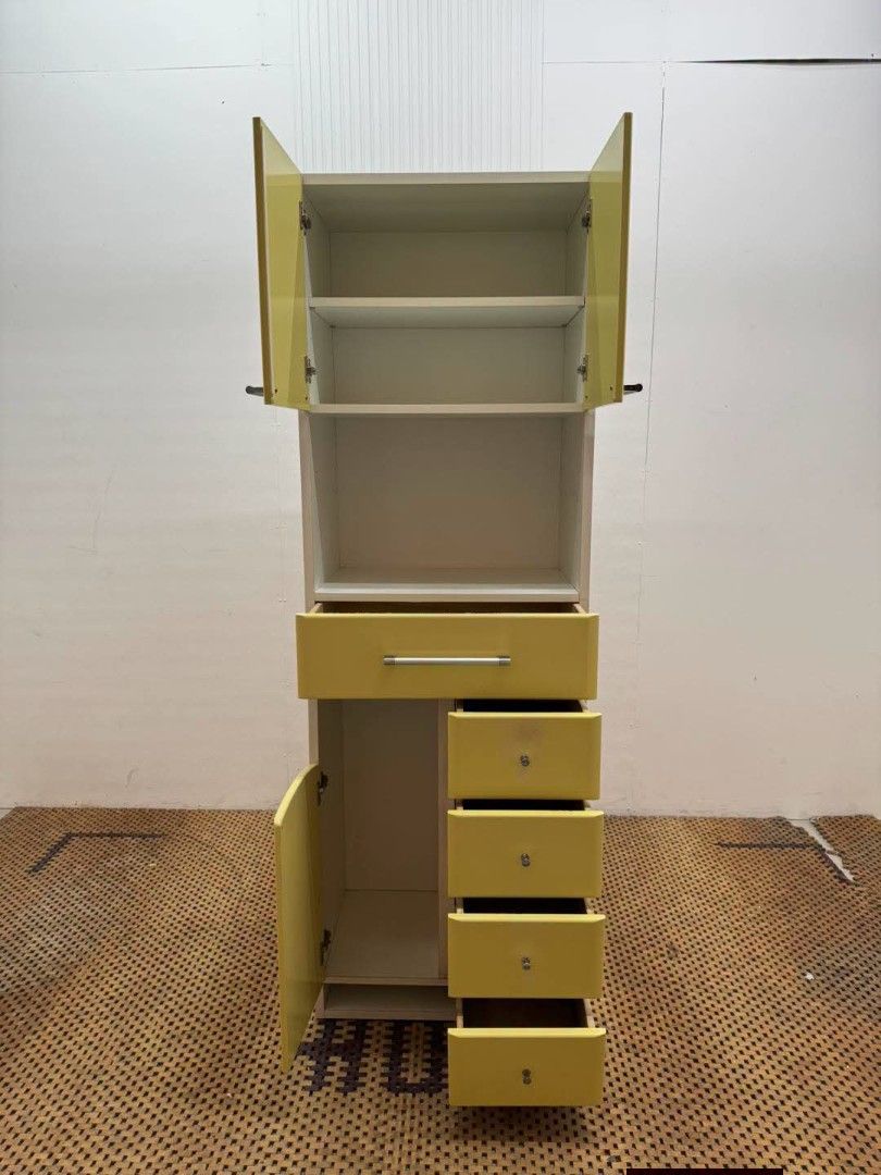 Kitchen Cabinet (Category: Shelves, Cabinets & Racks) located in Meycauayan. Submitted by marygracecasimiro (Listing ID 1459906363, Image 2). Description: Modern and Compact Yellow Green Kitchen Cabinet Price: 10,900 L23.5 x W16 x H71 In good condition♥️.