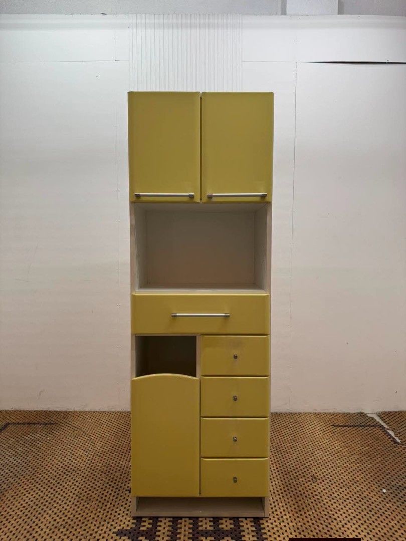 Kitchen Cabinet (Category: Shelves, Cabinets & Racks) located in Meycauayan. Submitted by marygracecasimiro (Listing ID 1459906363, Image 1). Description: Modern and Compact Yellow Green Kitchen Cabinet Price: 10,900 L23.5 x W16 x H71 In good condition♥️.