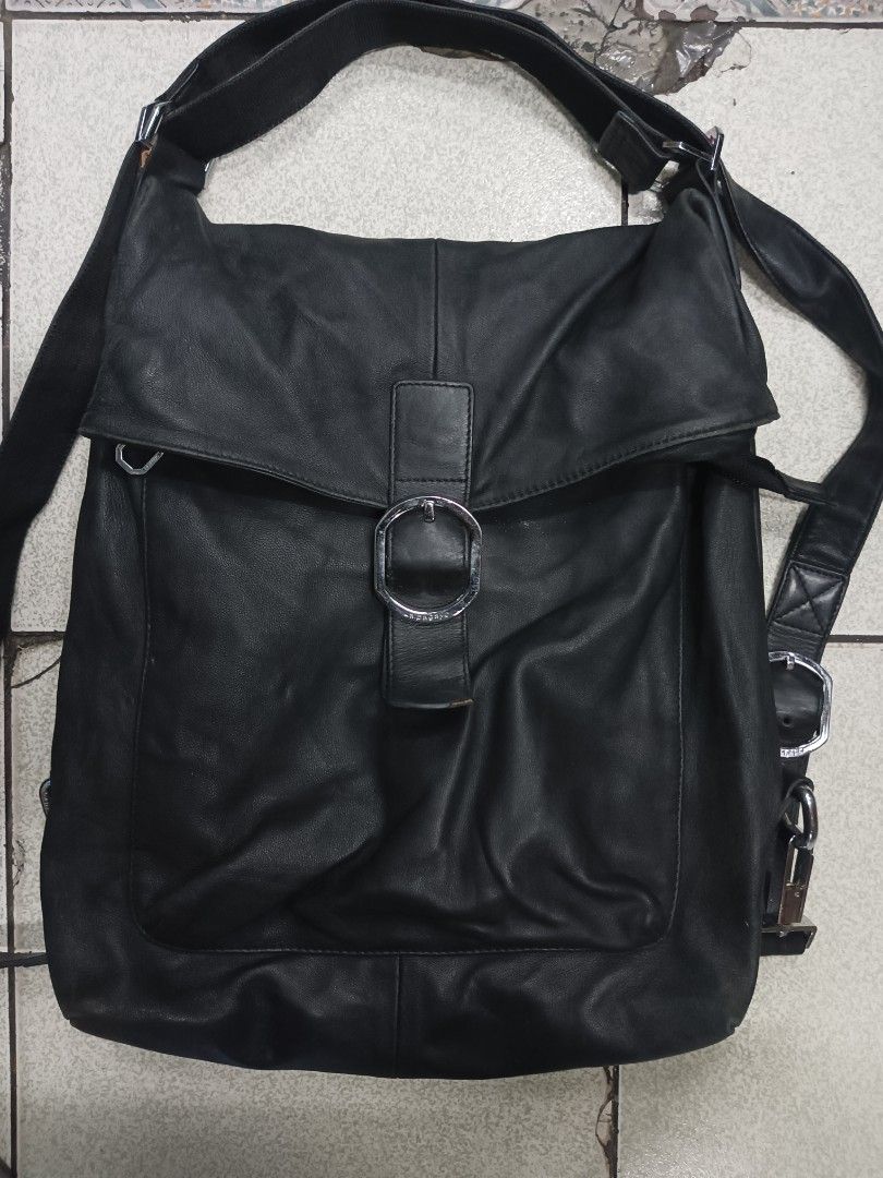 La Pagayo Black Leather Convertible Backpack/Shoulder Bag (Category: Backpacks) located in Quezon City. Submitted by arvietekto (Listing ID 1459920674, Image 2). Description: Lapagayo 3-way Genuine Leather bag backpack sling bag shoulder bag - Lapagayo genuine black leather bag - Convertible: can be worn as a backpack, shoulder bag or sling bag - Features a large buckle closure on the front flap - Includes a zippered pocket on the back - Interior