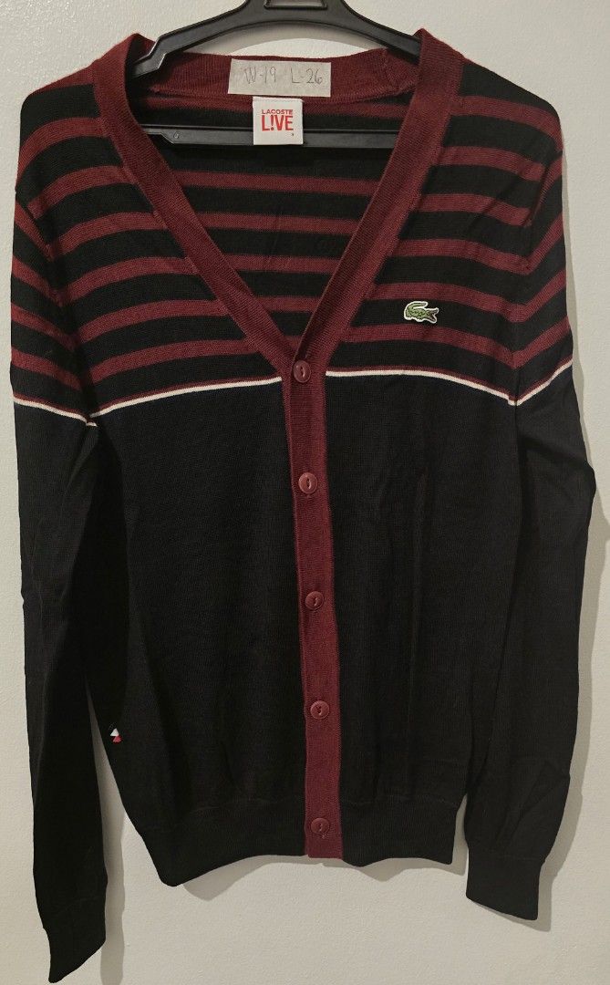 Lacoste Cardigan (Category: Coats, Jackets and Outerwear) located in Quezon City. Submitted by ShoesManila (Listing ID 1460075931, Image 1). Description: Lacoste Cardigan Wool material Condition: with hole, see photo Ready to ship Loc. Diliman, QC.