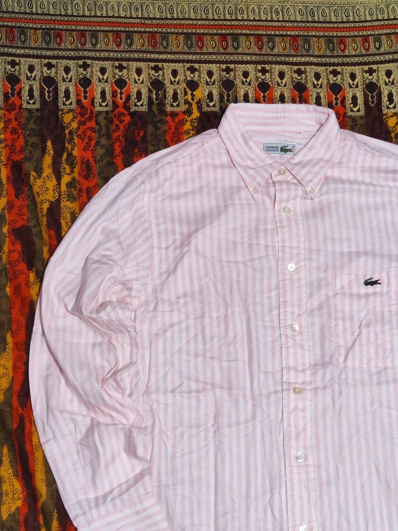 Lacoste Chemise Pinstripe button down shirt (Category: Luxury Apparel) located in Baguio. Submitted by damit_pang_tao (Listing ID 1460092630, Image 2). Description: Chemise Lacoste Pinstripe button down Dress shirt. Size on tag: 4 (US Medium) Dimensions: L29xW22xS24 Condition: excellent 9/10 (no hidden issues) Mine: 1280+sf Disclaimer: Damit Pang Tao is not affiliated or connected to the brand mentioned above or any posts this account will genera