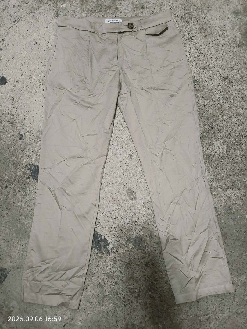 Lacoste Chino pants (Category: Luxury Apparel) located in Alburquerque. Submitted by ayrelieonlineshop (Listing ID 1460049345, Image 3). Description: Lacoste Chino pants size 36 dimensions W 30-31 L-36 hem 7 as new condition no pinhole or punit.