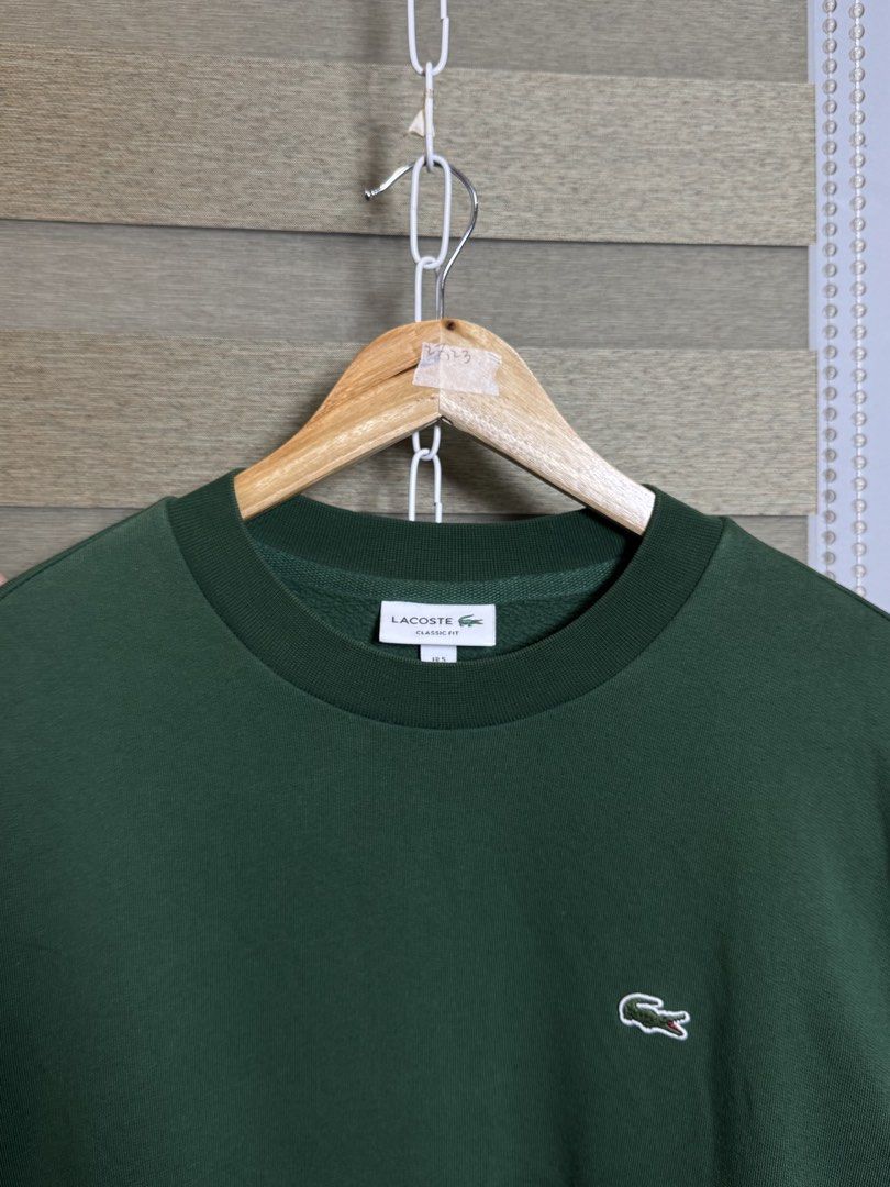 Lacoste forest green sweater (Category: Hoodies) located in Santa Ana. Submitted by thrift.sanctuary (Listing ID 1460081986, Image 2). Description: 27,23 dark green lacoste, like new condi.