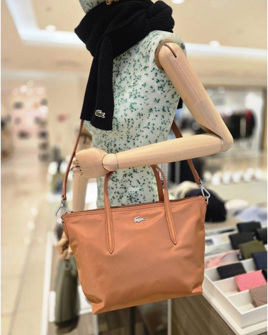 Lacoste Izzie Tote Mocha Mousse - PREORDER (Category: Tote Bags) located in Santa Rosa. Submitted by miqboutique (Listing ID 1460058945, Image 3). Description: Preorder✨ 🐊Izzie Tote Mocha Mousse ₱5,799 + SF • ETA Mid-End Oct • 3K DP required • Guaranteed Original Fb page: Miq's Boutique.