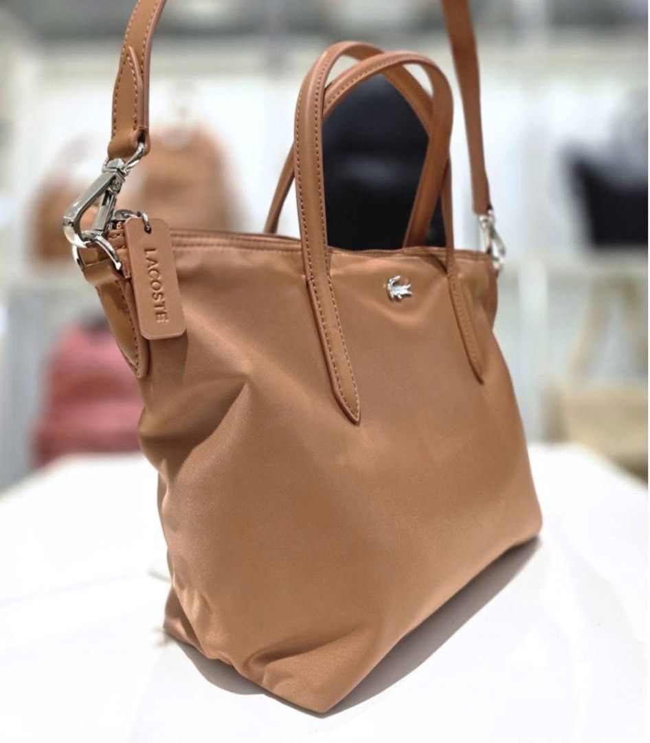 Lacoste Izzie Tote Mocha Mousse - PREORDER (Category: Tote Bags) located in Santa Rosa. Submitted by miqboutique (Listing ID 1460058945, Image 2). Description: Preorder✨ 🐊Izzie Tote Mocha Mousse ₱5,799 + SF • ETA Mid-End Oct • 3K DP required • Guaranteed Original Fb page: Miq's Boutique.