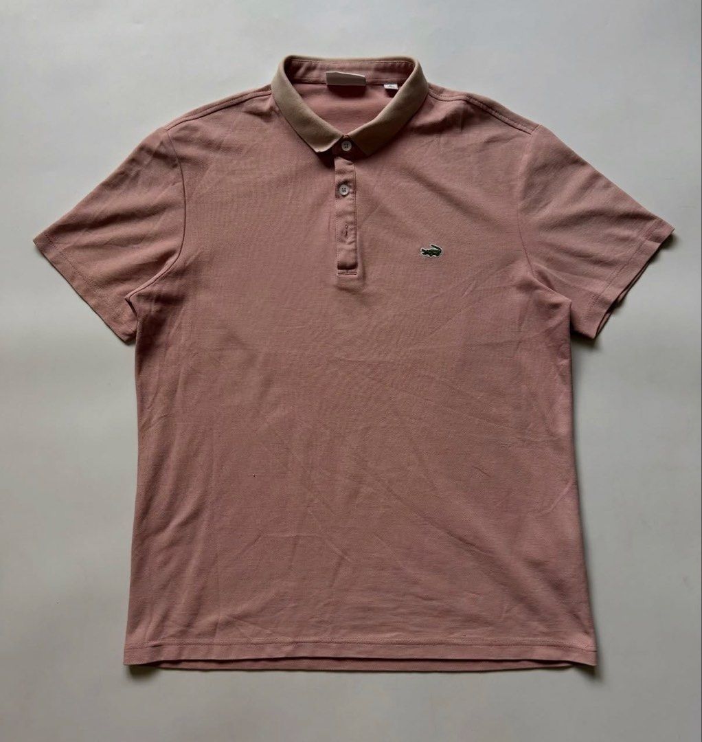 Lacoste Polo Shirt - Pink/Brown (Category: Tshirts & Polo Shirts ) located in Manila. Submitted by yurisgn (Listing ID 1460032160, Image 1). Description: - Classic short-sleeved polo shirt - Iconic crocodile logo on chest - Light brown contrasting collar - Two-button placket - Comfortable and breathable fabric - Perfect for casual wear.