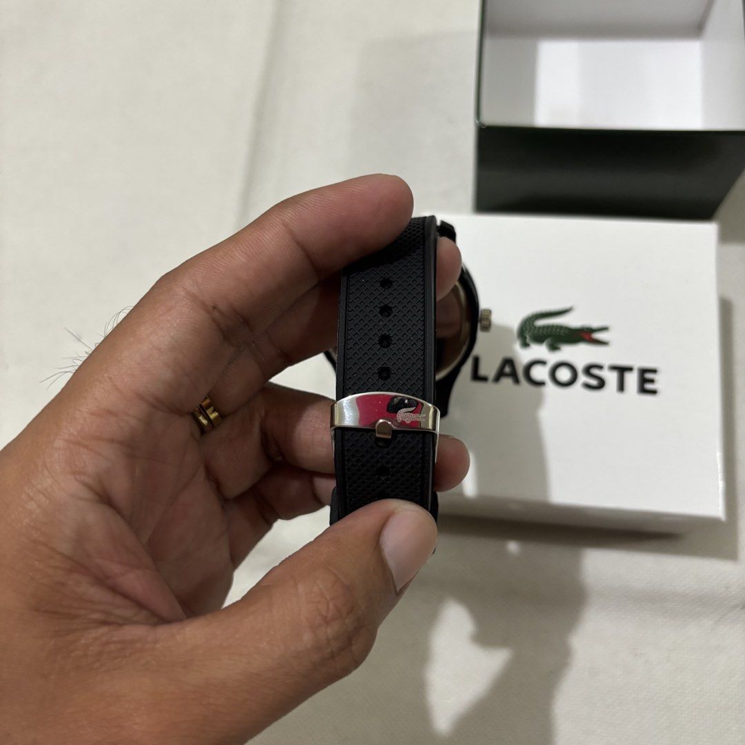 Lacoste Quartz Watch Black (Category: Women's Watches) located in Manila. Submitted by lestr.g (Listing ID 1460037888, Image 3). Description: - Black Lacoste watch - Dark red face - Quartz movement - Water resistant - Comes with original box - Ideal for everyday wear.