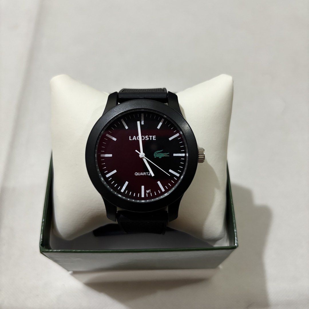 Lacoste Quartz Watch Black (Category: Women's Watches) located in Manila. Submitted by lestr.g (Listing ID 1460037888, Image 1). Description: - Black Lacoste watch - Dark red face - Quartz movement - Water resistant - Comes with original box - Ideal for everyday wear.