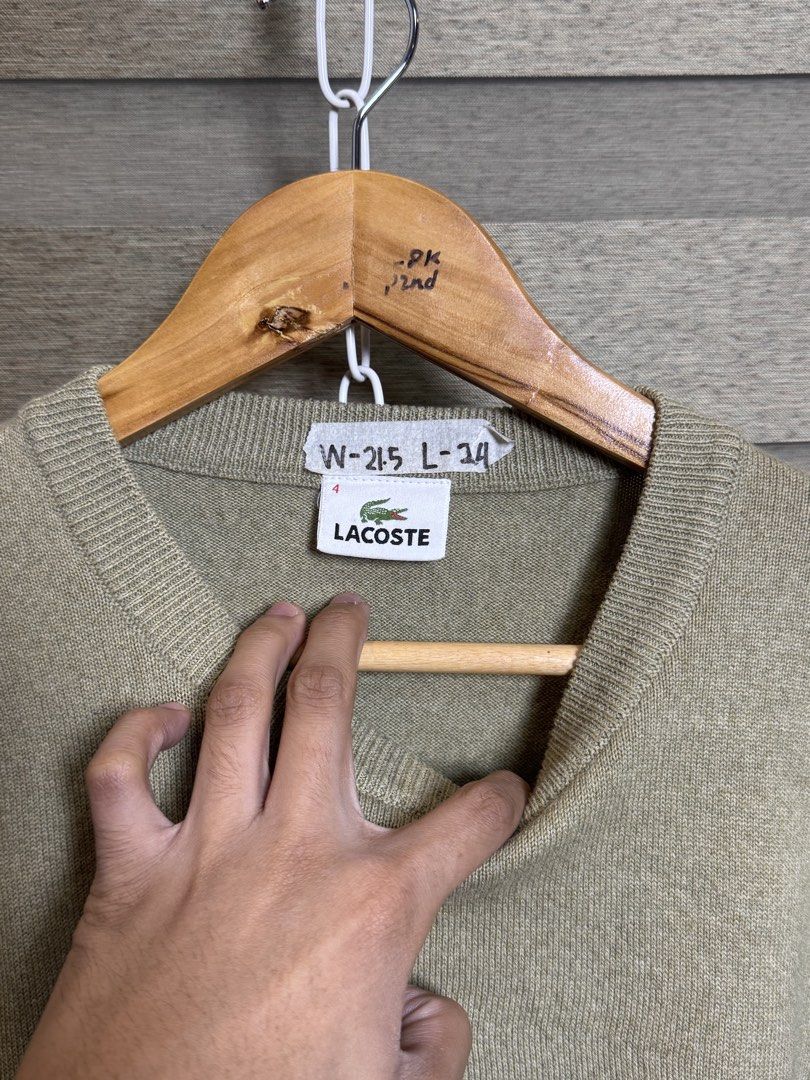 Lacoste Sweater Green Wool Blend Size L (Category: Coats, Jackets and Outerwear) located in Santa Ana. Submitted by thrift.sanctuary (Listing ID 1460082675, Image 3). Description: - Classic green Lacoste sweater - Made with a comfortable wool blend - Features the iconic crocodile logo - Size: Large (L) - Versatile for layering or standalone wear.