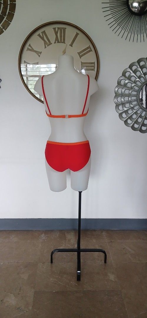 Lacoste Two piece Bikini Set No Pads (Category: Bikinis & Swimsuits) located in Batangas. Submitted by thriftshop_izy15 (Listing ID 1459947847, Image 2). Description: - Brand: Lacoste - Type: Two-piece Bikini Set - Color: Red with Orange Trim - Size: Medium (EU 38 / UK 10 / US 6) Waistline- 28" to 36" - Features: Iconic Lacoste crocodile logo - Condition: Good (as pictured) - Perfect for beach or pool days.
