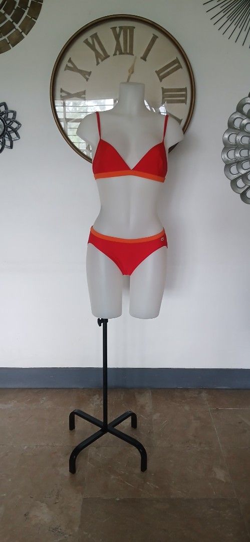 Lacoste Two piece Bikini Set No Pads (Category: Bikinis & Swimsuits) located in Batangas. Submitted by thriftshop_izy15 (Listing ID 1459947847, Image 1). Description: - Brand: Lacoste - Type: Two-piece Bikini Set - Color: Red with Orange Trim - Size: Medium (EU 38 / UK 10 / US 6) Waistline- 28" to 36" - Features: Iconic Lacoste crocodile logo - Condition: Good (as pictured) - Perfect for beach or pool days.