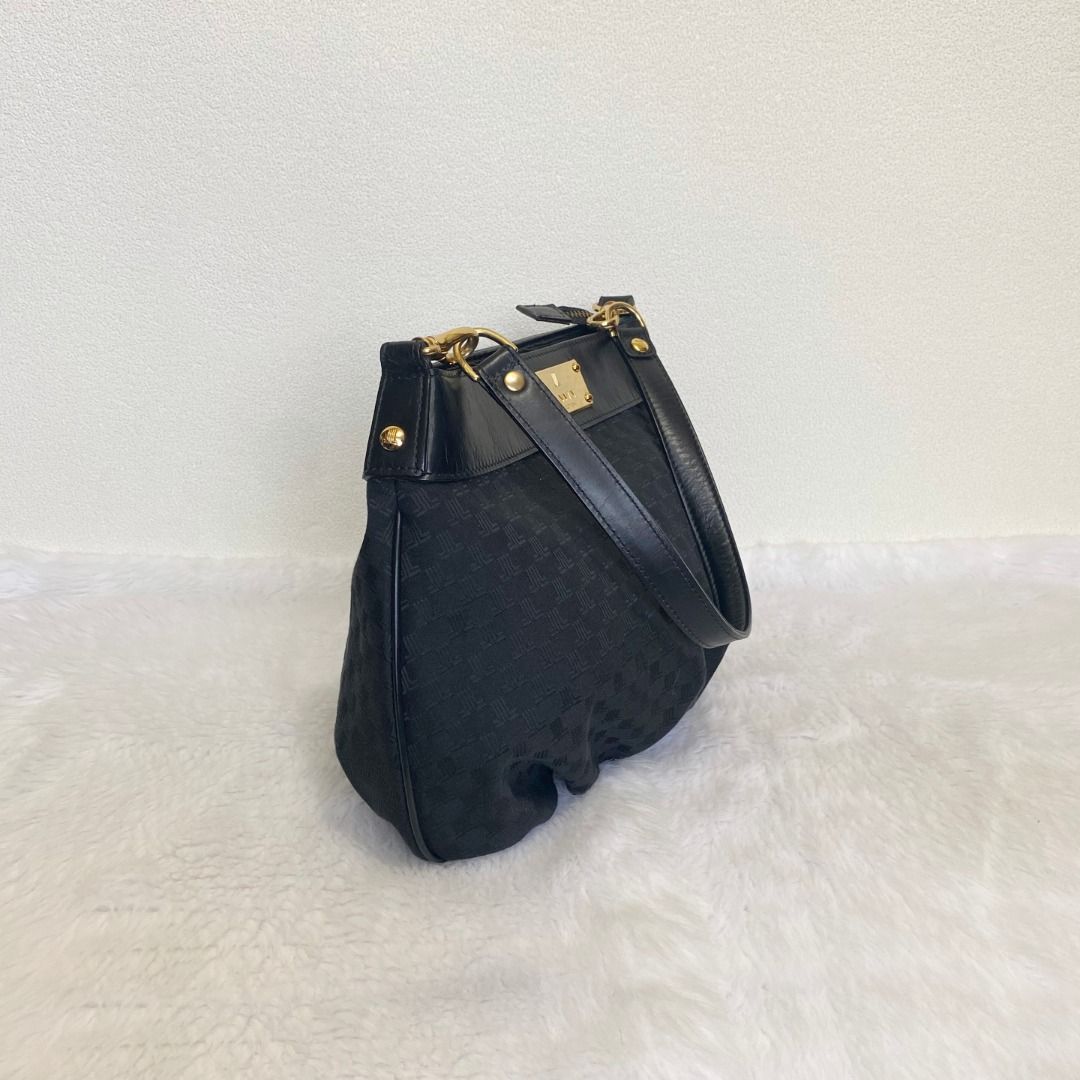 Lanvin Black Logo Monogram Canvas Leather Shoulder Bag (Category: Shoulder Bags) located in Cebu City. Submitted by posh_avenue888 (Listing ID 1460072098, Image 2). Description: In very good condition. From Japan. Crafted in canvas & genuine leather. 100% authentic!!! 13.5" x 8.5" x 3"..