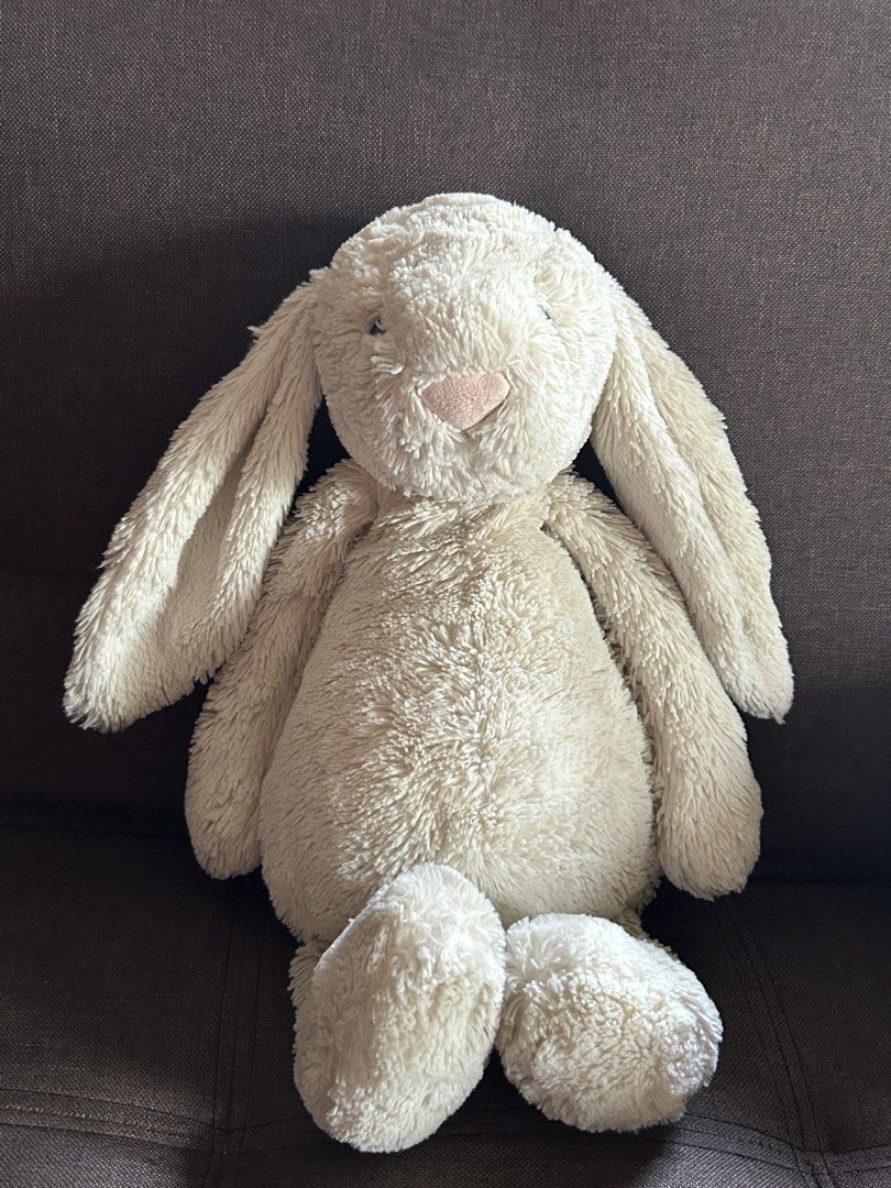 Large Authentic Cream Bashful bunny jellycat (Category: Plushies & Soft Toys) located in Manila. Submitted by zencharm (Listing ID 1460050546, Image 1). Description: - Super soft and cuddly Jellycat bunny - Cream color - Long floppy ears and cute tail - Ideal for kids or as a decorative piece - Clean and ready for a new home.