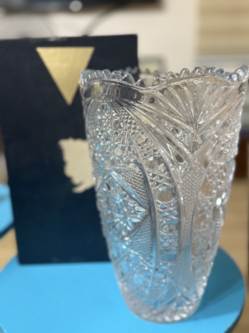 Lead Crystal Flower Vase - Framed Glass (Category: Vases & Decorative Bowls) located in Mandaluyong City. Submitted by ardzensthrift (Listing ID 1459964800, Image 1). Description: This is a vintage Kamei Glass Premio heavy cut lead crystal flower vase (crystal flower base) from Japan Beautiful lead crystal flower vase. Intricate patterned glass. Comes in original box. Great for displaying flowers. Adds a classic touch to any room..
