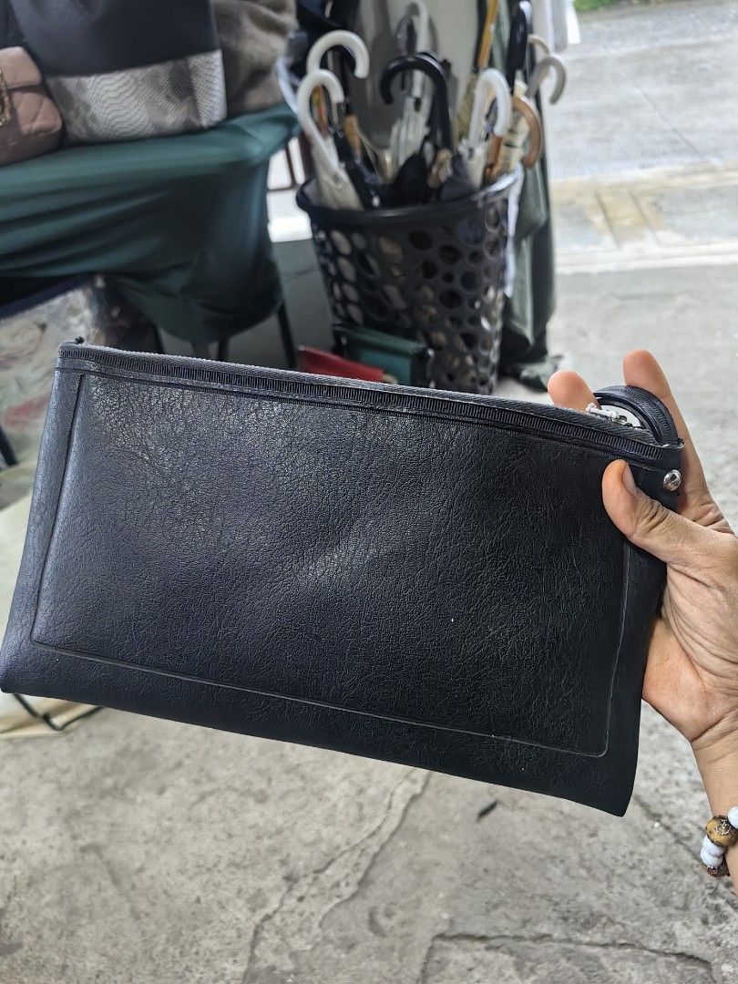Leather clutch bag (Category: Clutches) located in Calamba. Submitted by princesspauliney. (Listing ID 1460012311, Image 1). Description: Good condition leather clutch bag Shoppee check out GCASH payment.