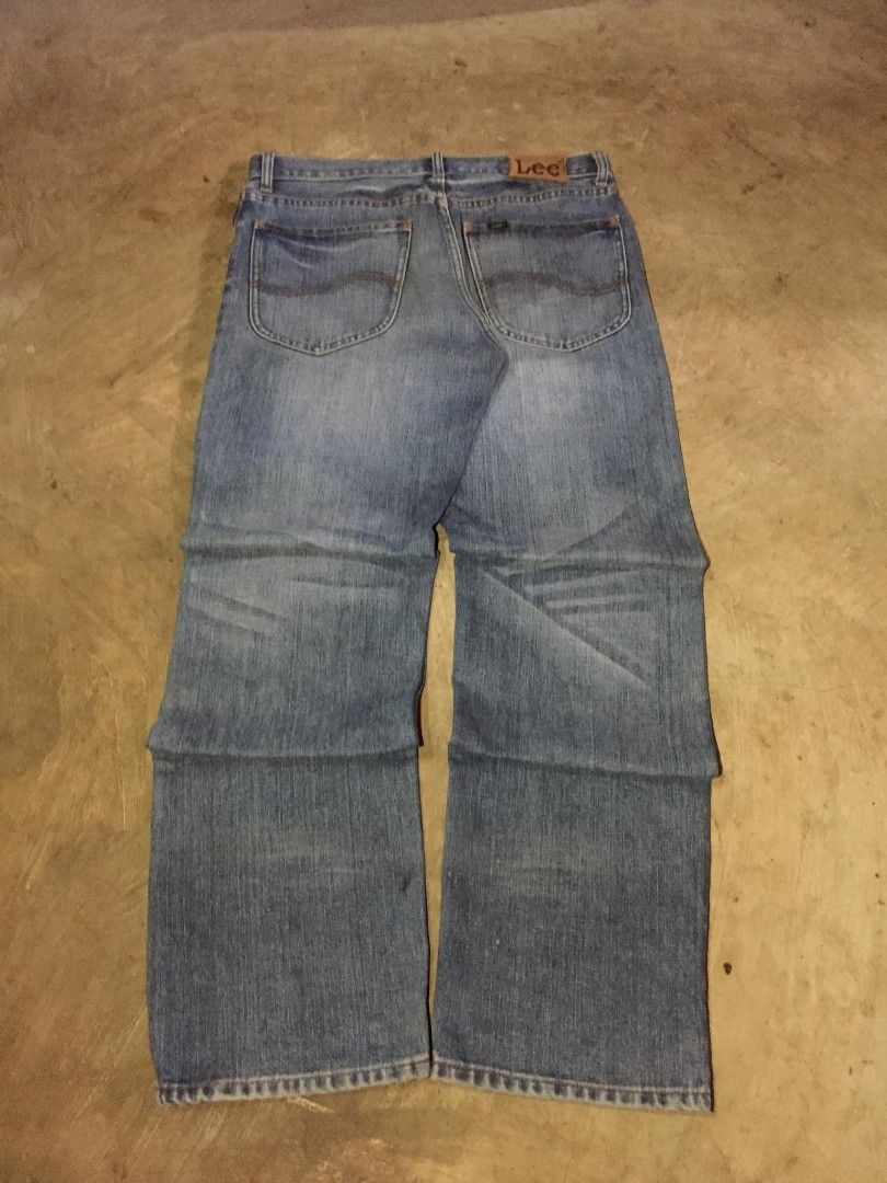Lee Jeans - Blue Denim - Straight Leg (Category: Activewear) located in Calabanga. Submitted by oc_drip_ph. (Listing ID 1460101315, Image 2). Description: - Classic blue denim jeans from Lee - Straight leg cut - Button and zip closure - Two front pockets and two back pockets - Slightly faded wash for a vintage look - Ideal for everyday wear.