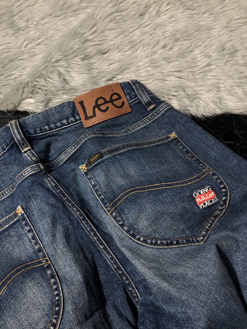 Lee Jeans Regular Fit Distressed Denim (Category: Jeans) located in Baguio. Submitted by mekabee_moon (Listing ID 1460056211, Image 3). Description: - Brand: Lee Jeans - Fit: Regular - Wash: Classic blue denim - Features: Distressed details, small rip on right leg - Style: Comfortable for everyday wear WAISTLINE:32-34 via tape measure.
