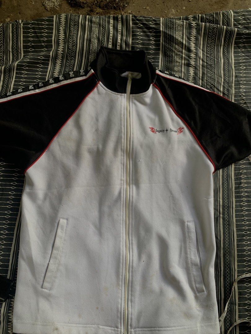 Legacy House Dragon Track Jacket White Black Red (Category: Coats, Jackets and Outerwear) located in Caloocan City. Submitted by niannnnnnnnnn (Listing ID 1460043661, Image 1). Description: - Legacy House Track Jacket - Color: White body, black sleeves, red trim - Design: Embroidered dragon on the back - Closure: Zipper front - Pockets: Two front pockets - Style: Ideal for casual wear.