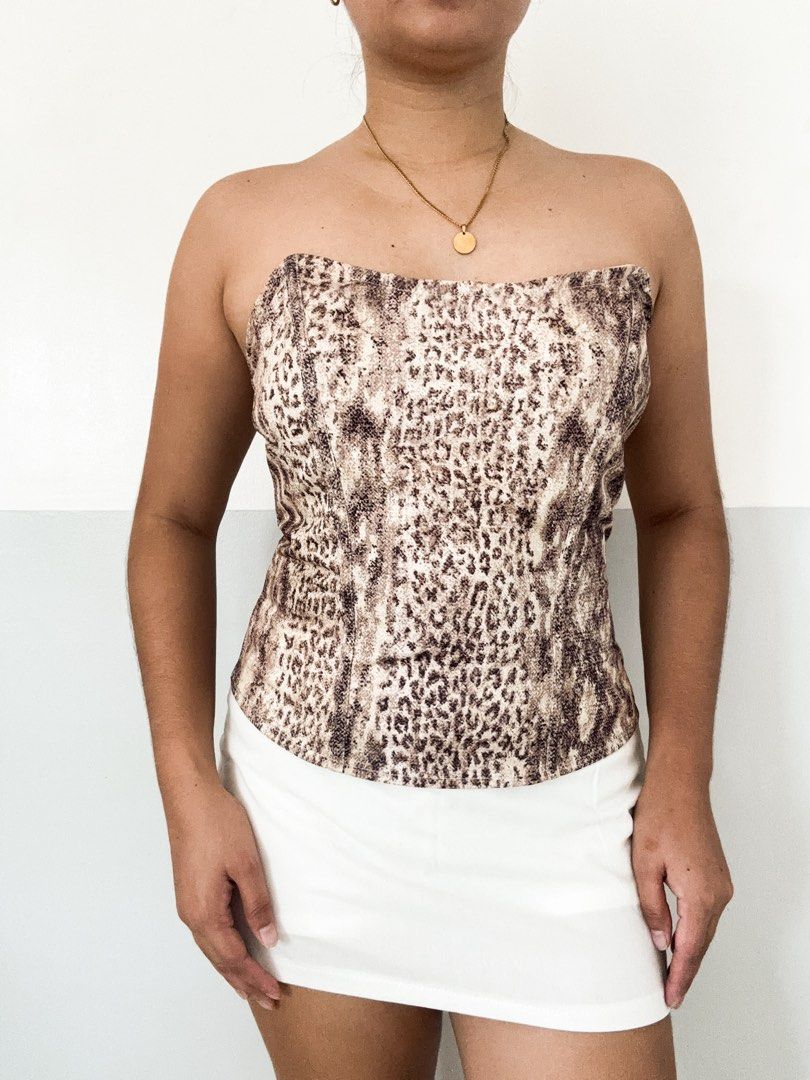 Leopard Print Tube Top Corset Style (Category: Others Tops) located in Maasin. Submitted by yemashop (Listing ID 1459964990, Image 1). Description: RFS: Decluttering FREE SHIPPING!!! - Cute leopard print tube top - Corset style with a structured fit - Strapless design - Versatile for skirts or high-waisted pants - Ideal for night outs or casual days.