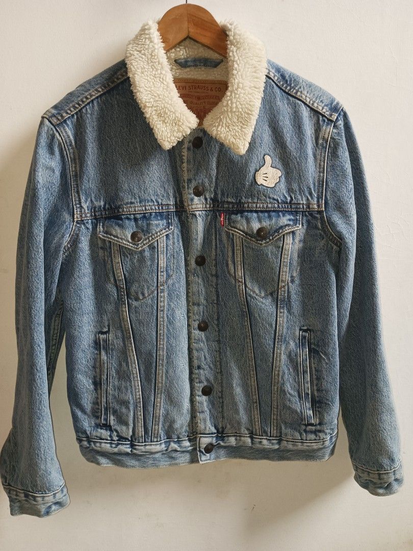 Levi's Denim Sherpa Jacket Mickey Mouse Edition Size S (Category: Coats, Jackets and Outerwear) located in Jolo. Submitted by zah-zah (Listing ID 1460012789, Image 1). Description: - Cool Levi's denim jacket - Cozy sherpa lining for warmth - Fun Mickey Mouse graphic on the back - Small Mickey detail on the chest - Classic button closure - Made in China.