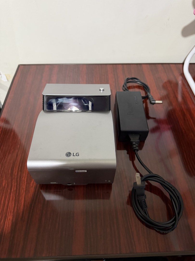 LG PH450UG Projector for Sale (Category: Projectors) located in Manila. Submitted by gojoe_665 (Listing ID 1459948790, Image 2). Description: 📽️ LG PH450UG-GL Ultra Short Throw Projector 💰 ₱13,500 negotiable ✅ Fully working ✅ Original charger included ✅ Ultra Short Throw — can project a large screen even from a short distance ✅ Compact and portable 📅 Manufactured April 2017 ❌ No remote included Selling as-is. Feel free to ask for actual photos