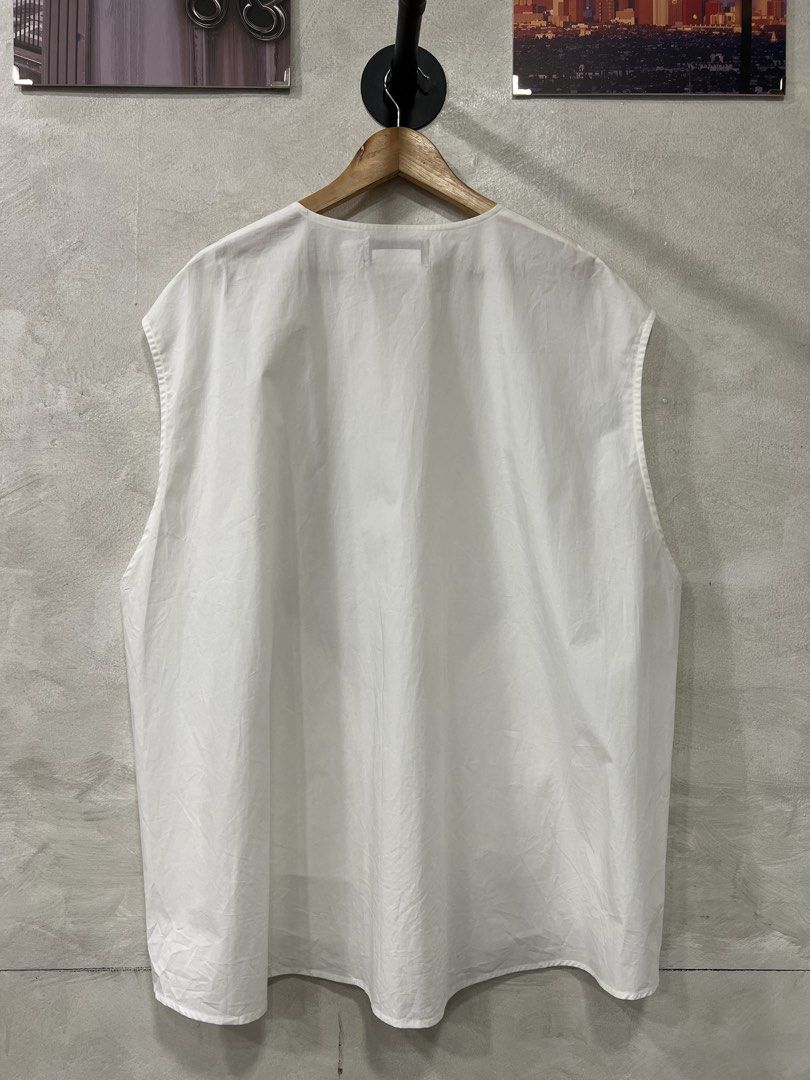 Licht Bestreben Utility Inner Shirt (Category: Sets & Coordinates) located in Manila. Submitted by -handpick- (Listing ID 1459948534, Image 2). Description: This is a white sleeveless shirt vest from Licht Bestreben featuring distinct structural paneling down the front. -Free size Dimensions : Length: 30 to 32 inches Width: 28 inches Shoulder : 22 inches Sign of wear in good condition .