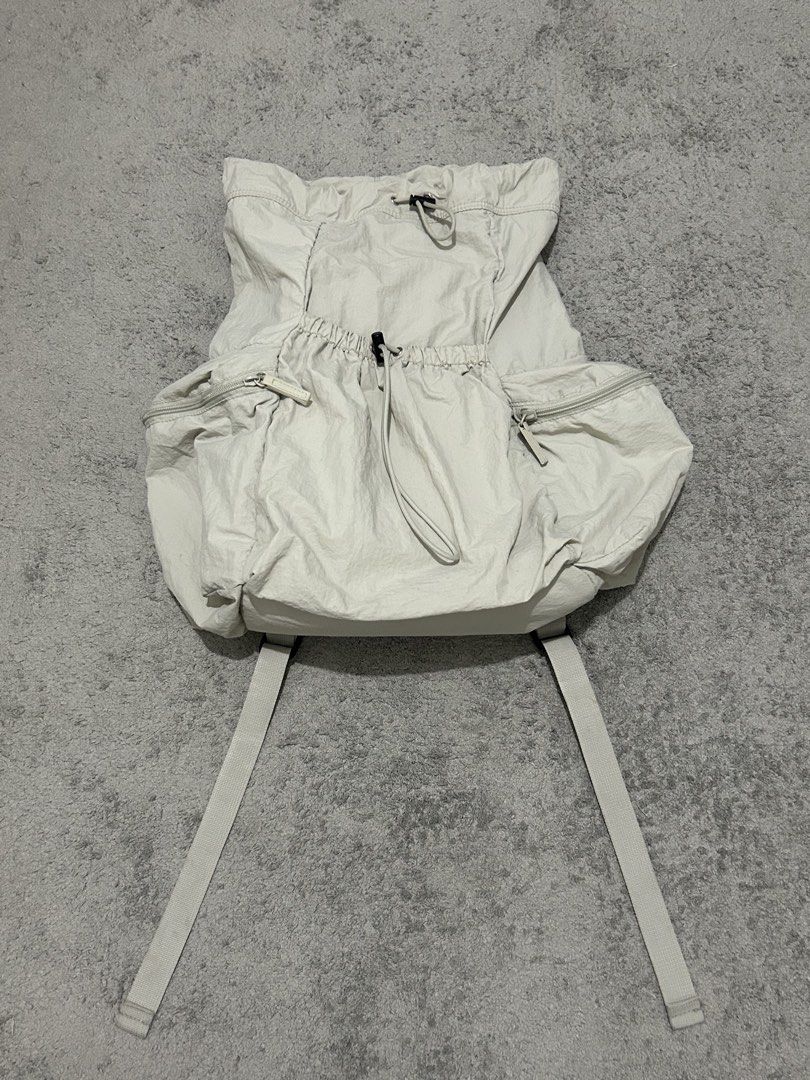 GU nylon backpack (Category: Backpacks) located in Manila. Submitted by acesarchive (Listing ID 1460062231, Image 3). Description: GU nylon backpack in off white 🤍 ⟡ lightweight nylon material ⟡ strings and zippers are in good condition ⟡ purchased from GU japan.