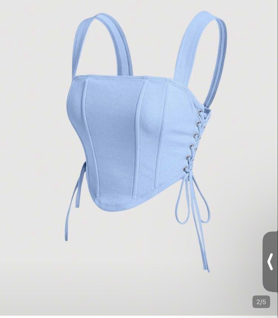 Light Blue Corset Top with Lace-Up Sides (Category: Others Tops) located in Quezon City. Submitted by jezjewels.ph (Listing ID 1459968371, Image 1). Description: - Cute light blue corset top - Adjustable lace-up sides for a custom fit - Adjustable straps - Perfect for layering or wearing on its own - Pairs well with jeans or a skirt.