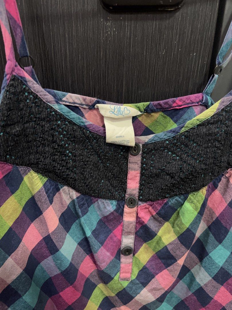 Lily Two-Piece Plaid Cami with Twist Front Grey Top (Category: Sleeveless) located in Ramon. Submitted by polkaprincess (Listing ID 1460064111, Image 3). Description: - Two-piece top set - Grey twist-front cropped top - Colorful plaid camisole with black lace trim - Button details on camisole - Camisole is size small - Perfect for casual wear.