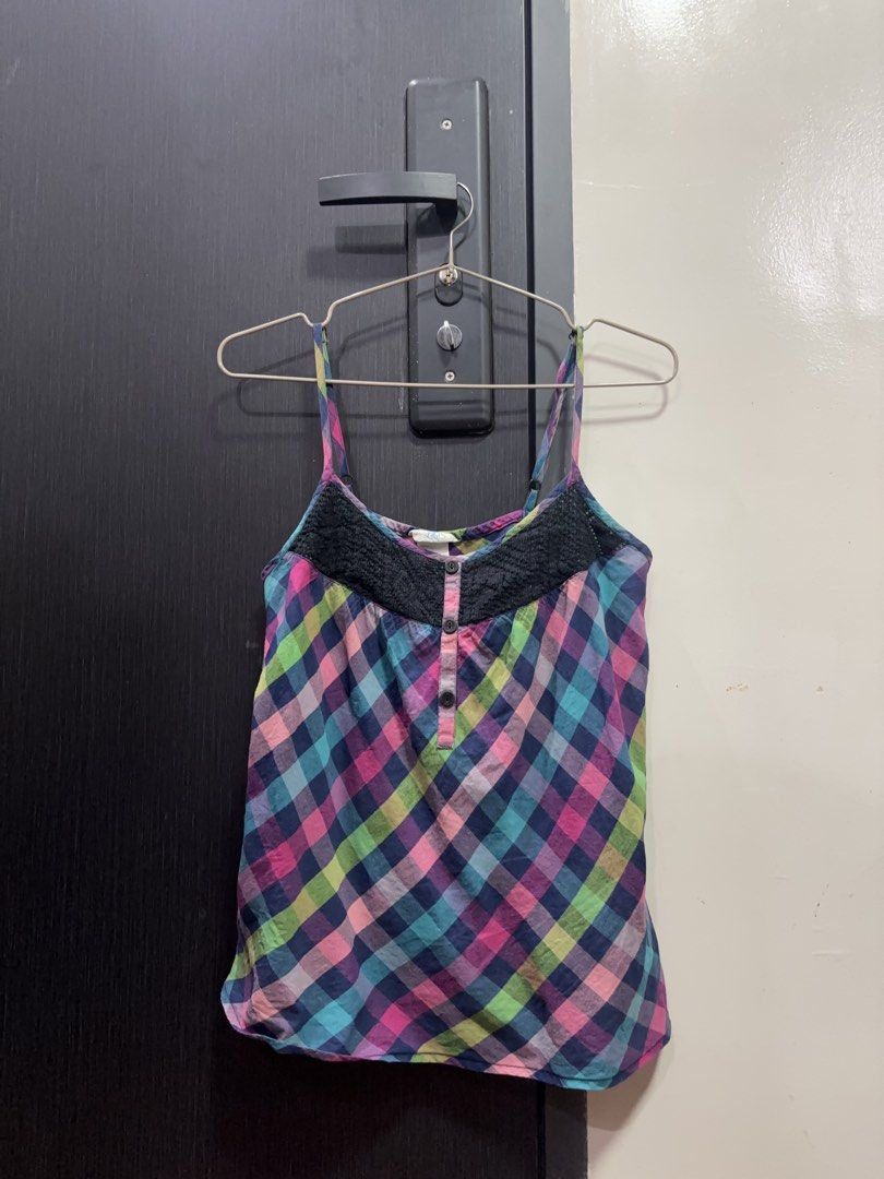 Lily Two-Piece Plaid Cami with Twist Front Grey Top (Category: Sleeveless) located in Ramon. Submitted by polkaprincess (Listing ID 1460064111, Image 2). Description: - Two-piece top set - Grey twist-front cropped top - Colorful plaid camisole with black lace trim - Button details on camisole - Camisole is size small - Perfect for casual wear.