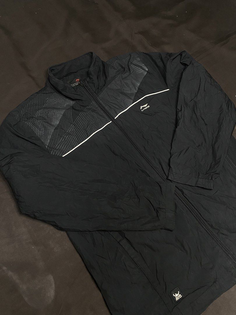 Li-Ning Waterproof Jacket (Category: Coats, Jackets and Outerwear) located in Bay. Submitted by paoloconic70568 (Listing ID 1459948516, Image 2). Description: Li-Ning Waterproof Jacket Color Rate: 10/10 Color may vary due to lighting XXL on tag W-22 L-30 Issue: None.