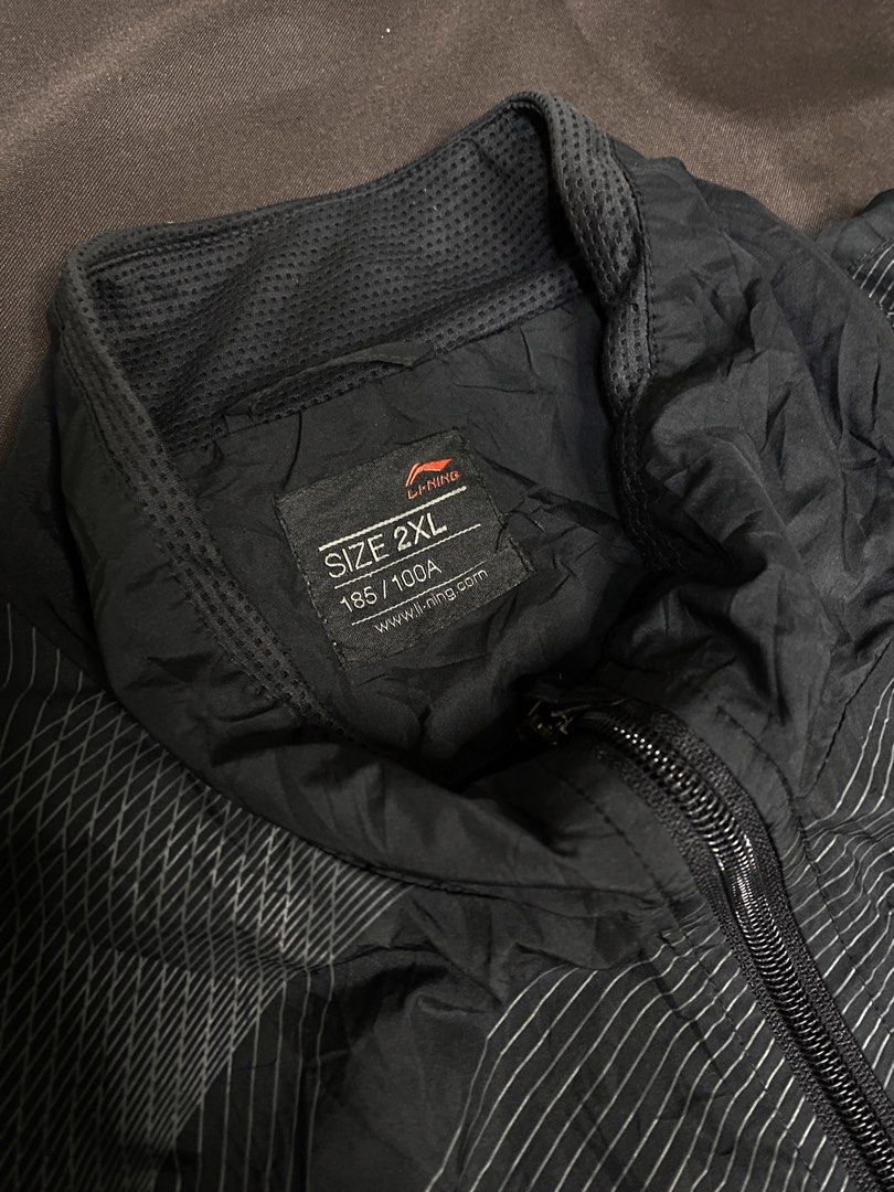 Li-Ning Waterproof Jacket (Category: Coats, Jackets and Outerwear) located in Bay. Submitted by paoloconic70568 (Listing ID 1459948516, Image 3). Description: Li-Ning Waterproof Jacket Color Rate: 10/10 Color may vary due to lighting XXL on tag W-22 L-30 Issue: None.