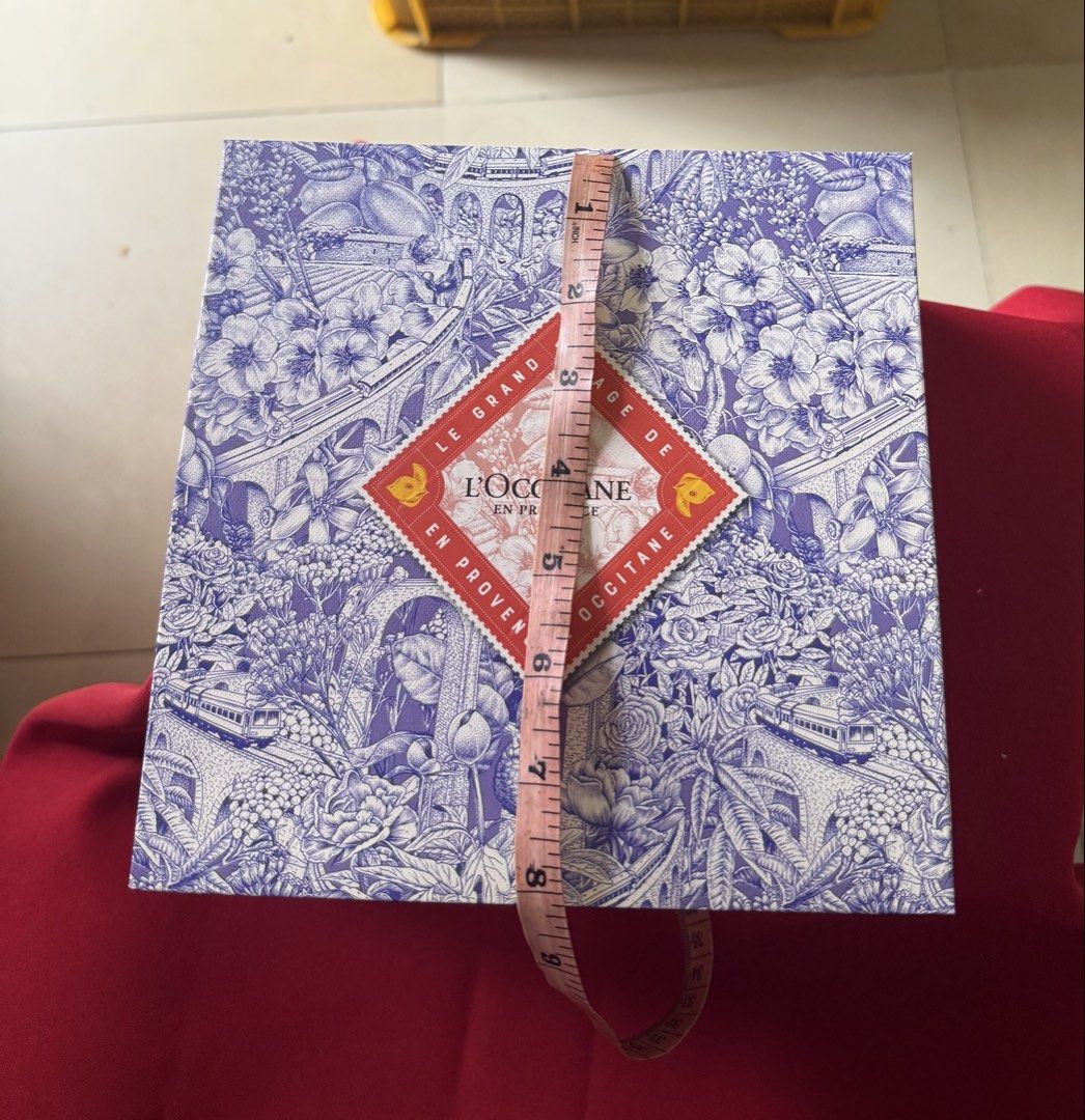 L'Occitane En Provence Decorative Gift Box (Category: Storage Boxes & Baskets) located in Mandaue City. Submitted by erin_grace (Listing ID 1459951022, Image 1). Description: - Beautiful L'Occitane gift box - Features a lovely blue and white floral toile pattern - Dimensions: Approx. 8”x8”x4” - Perfect for storing small items or as a decorative piece - Great for gifting or personal use.