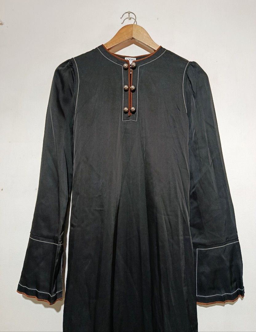 Loewe - Black Crew Neck Long Dress (Category: Dresses) located in San Fernando. Submitted by son.twice.stuff (Listing ID 1460053556, Image 3). Description: Item: Loewe - Black Crew Neck Long Dress Tagged Size: 34 Fit Small Dimensions Length: 55" Armpit To Armpit: 14" Waistline: 14" Shoulder: 13" Sleeve: 25" Condition: Excellent Zipper: YKK Puller: LOEWE Made In Italy Material 65% Triacetate 35% Polyester Price: 12800 Free Shipping.