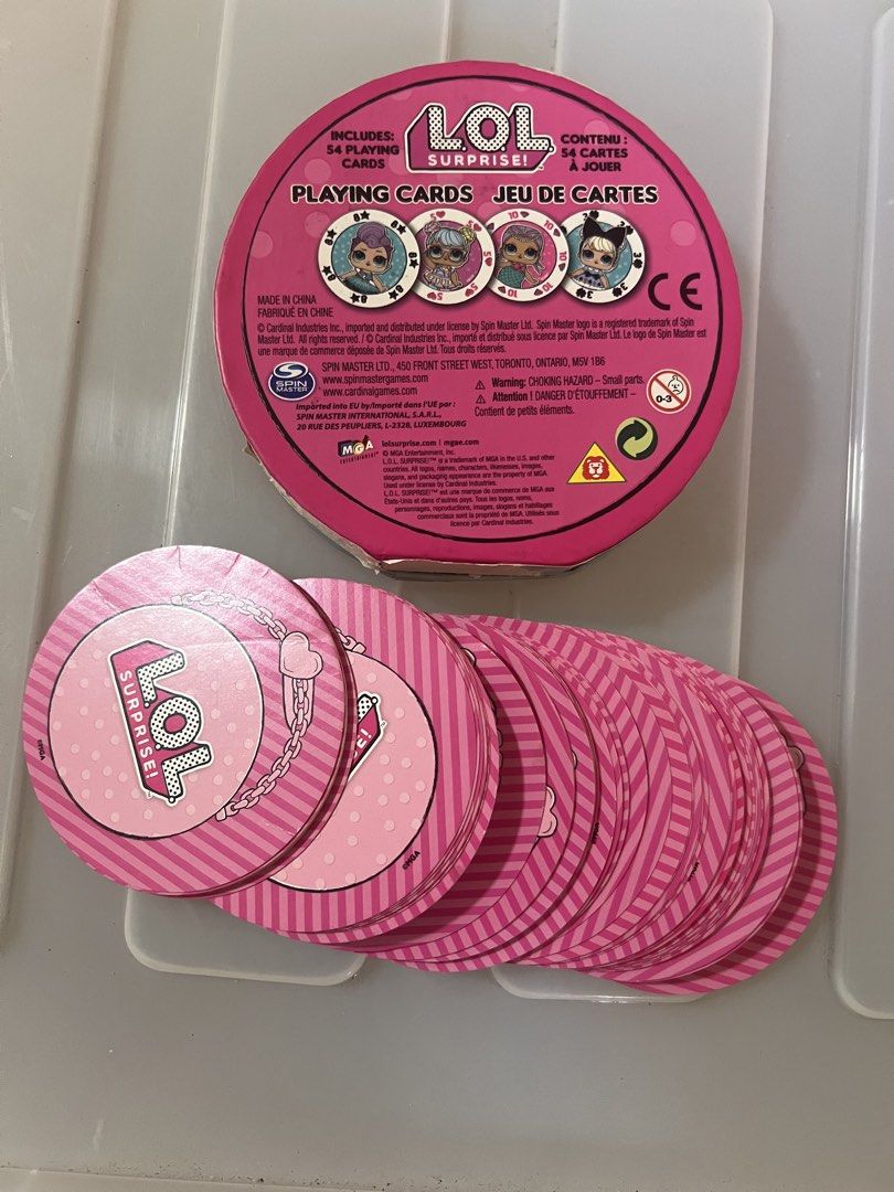 LOL Surprise Playing Cards Tin (Category: Board Games & Puzzles) located in Taguig. Submitted by amorzy (Listing ID 1460024162, Image 2). Description: - LOL Surprise themed playing cards - Comes in a cute round tin - Includes 54 cards - Great for kids, collectors, and family game nights - Ideal gift for any LOL Surprise enthusiast Location: Upper Bicutan.
