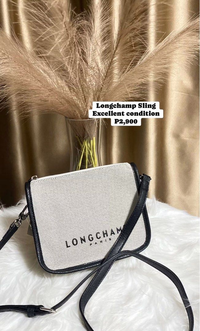 Longchamp Sling Bag - Excellent Condition (Category: Cross-body Bags) located in Pasay City. Submitted by 2ndloveforever2023 (Listing ID 1460089008, Image 1). Description: - Longchamp sling bag - Material: Canvas with leather trim - Color: Black and cream - Closure: Zipper - Strap: Adjustable - Ideal for: Everyday use - Price: P2,900.
