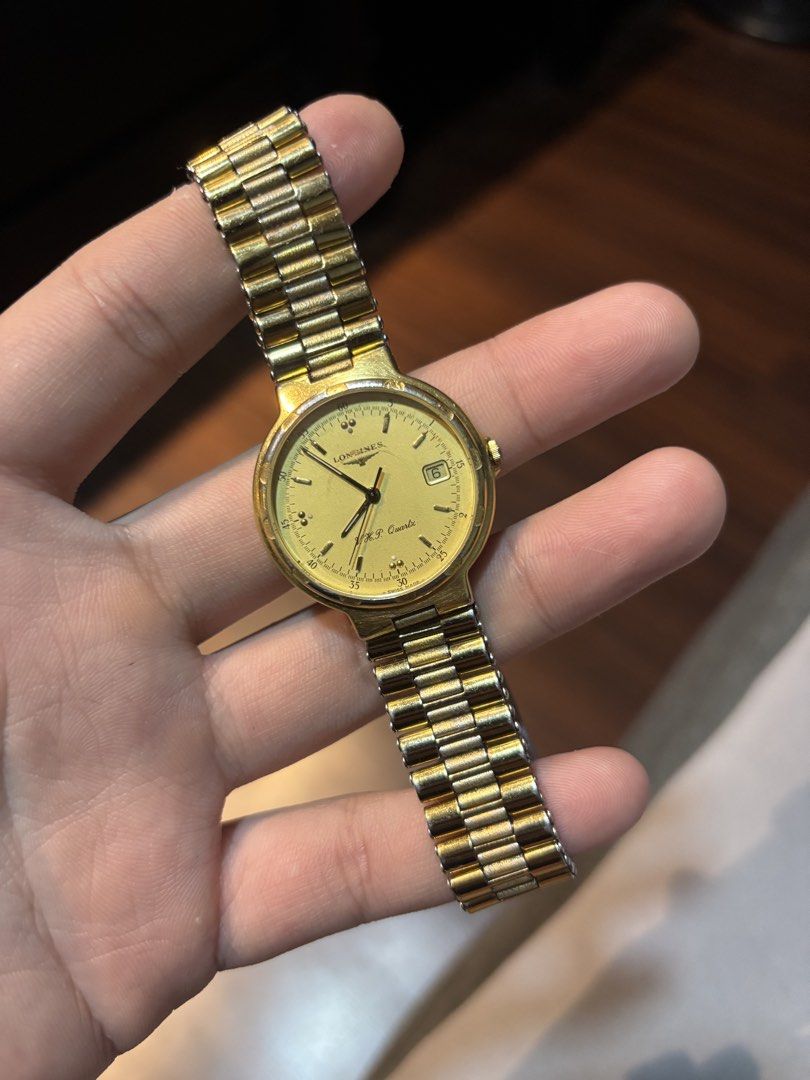 Longines Conquest VHP gold tone watch (Category: Luxury Watches) located in Manila. Submitted by maxxxxxxxxxxxx (Listing ID 1459916313, Image 2). Description: For sale Authentic Swiss Longines Very high precision Conquest Gold tone mens watch Nice and large bracelet Good running condition Crown was just replace and patina on dial please see pics Thats why selling cheap.
