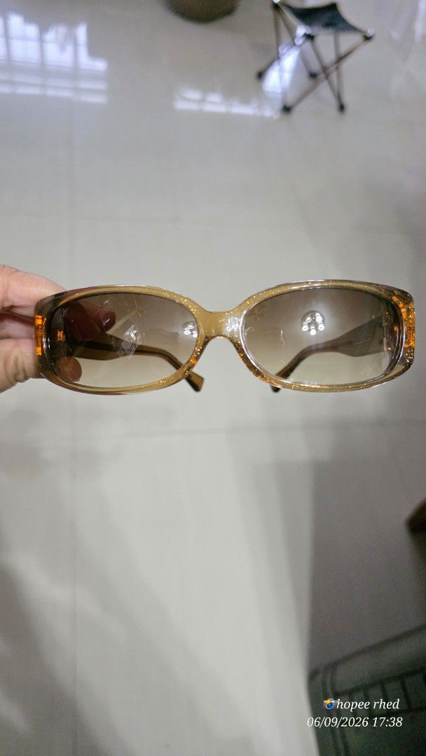 Louis Vuitton Brown Glitter Acetate Square Sunglasses (Category: Sunglasses & Eyewear) located in Baguio. Submitted by timmy_son (Listing ID 1460010987, Image 1). Description: - Authentic Louis Vuitton Sunglasses - Brown Glitter Acetate Frames - Square Shape - Made in France - Model: Z0008E CE 57 14 C0066 - Original Retail Price: $359.10 - Condition: Selling as is.