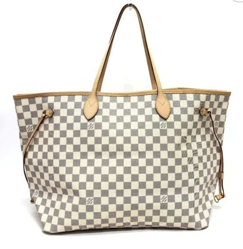 Louis Vuitton Damier Azur Neverfull GM Tote Bag (Category: Luxury Bags & Wallets) located in Taguig. Submitted by divine_kitty (Listing ID 1460088607, Image 1). Description: - Louis Vuitton Neverfull GM tote bag - Damier Azur canvas - Largest size (GM), ideal for travel or everyday - Features leather trim and handles - Spacious interior with zip pocket and main compartment - Coded.