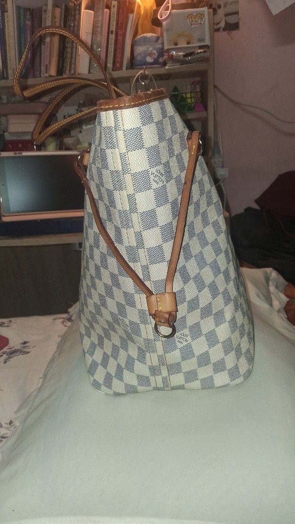 Louis Vuitton Damier Azur Neverfull GM Tote Bag (Category: Luxury Bags & Wallets) located in Taguig. Submitted by divine_kitty (Listing ID 1460088607, Image 3). Description: - Louis Vuitton Neverfull GM tote bag - Damier Azur canvas - Largest size (GM), ideal for travel or everyday - Features leather trim and handles - Spacious interior with zip pocket and main compartment - Coded.