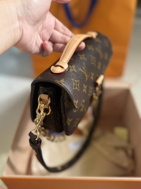Louis Vuitton East West Metis Monogram (Category: Luxury Bags & Wallets) located in Taguig. Submitted by authenticniceseller (Listing ID 1459903244, Image 2). Description: - Authentic Louis Vuitton Pochette Metis - Iconic Monogram Canvas - 2 straps: Gold Chain Strap and adjustable leather strap - Leather Top Handle - Includes Original Box - Includes Dust Bag - Timeless and classic piece.