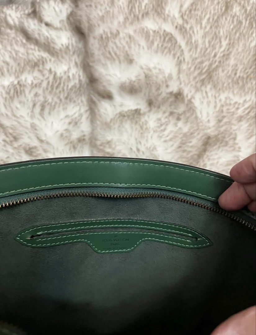 Louis Vuitton Epi Leather Handbag - Green (Category: Luxury Bags & Wallets) located in Manila. Submitted by chantalsalonga (Listing ID 1460089845, Image 3). Description: - Authentic Louis Vuitton handbag - Made with luxurious Epi leather - Color: Green - Secure zipper closure - Interior pocket for essentials - Comes with original dust bag - Ideal for everyday use.