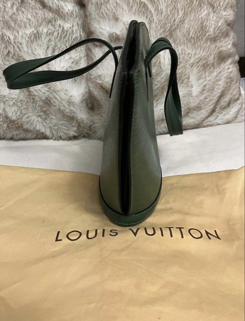 Louis Vuitton Epi Leather Handbag - Green (Category: Luxury Bags & Wallets) located in Manila. Submitted by chantalsalonga (Listing ID 1460089845, Image 2). Description: - Authentic Louis Vuitton handbag - Made with luxurious Epi leather - Color: Green - Secure zipper closure - Interior pocket for essentials - Comes with original dust bag - Ideal for everyday use.
