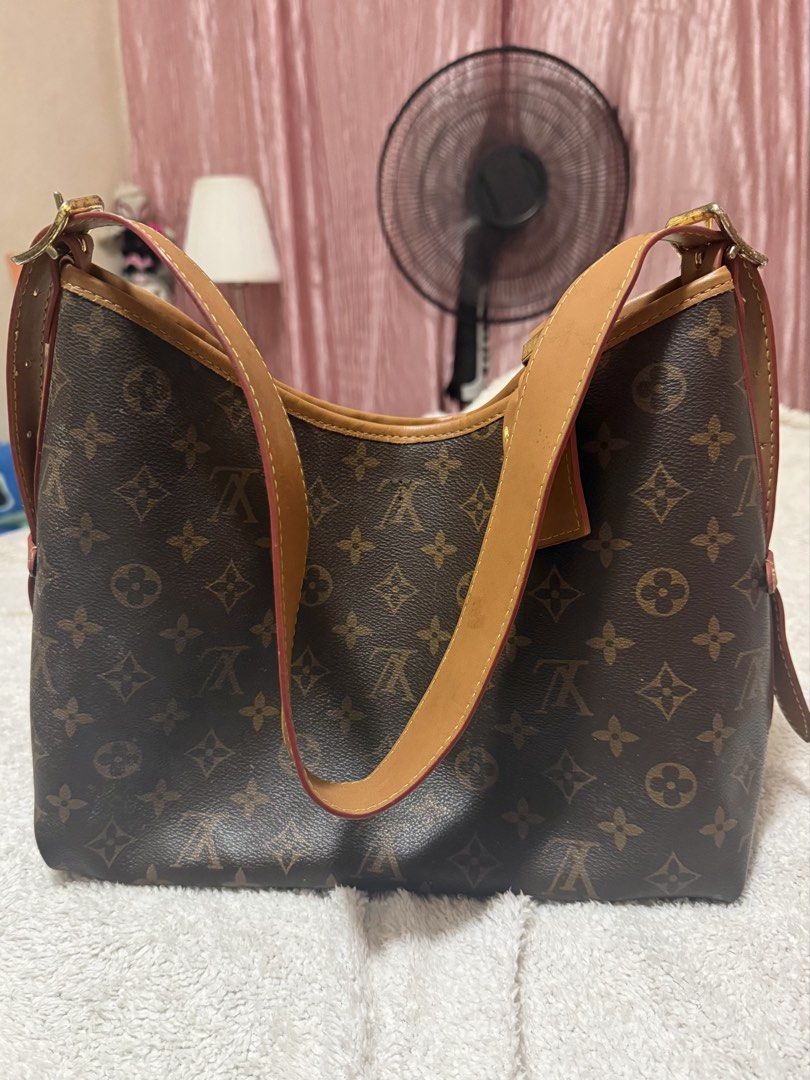 Louis Vuitton Monogram Carryall bag (Category: Luxury Bags & Wallets) located in Las Pinas. Submitted by closethaulsph (Listing ID 1460101680, Image 2). Description: -Lv CarryAll Monogram Canvas PM hobo bag -as the photo - Burgundy interior with zippered and slip pockets - Secure magnetic snap closure - Ideal for everyday use.