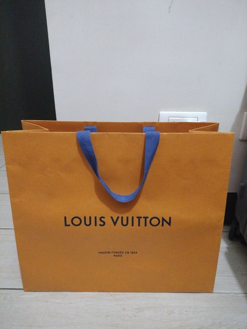 Louis Vuitton paper bag (Category: Luxury Accessories) located in Makati City. Submitted by cyluxxeshop (Listing ID 1459929812, Image 1). Description: 👍🏿 height is 13 inches 👍🏿length is 16 inches 👍🏿mode of payment gcash 👍🏿+sf.