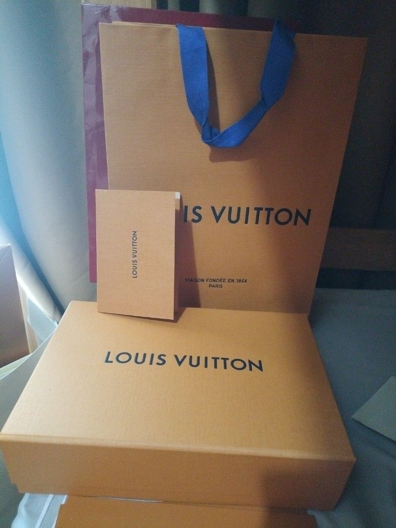 Louis Vuitton paper bag,box,card envelope (Category: Luxury Accessories) located in Makati City. Submitted by cyluxxeshop (Listing ID 1459927807, Image 1). Description: 👍🏿paper bag height is 14 inches 👍🏿paper bag length is 10 inches 👍🏿box height is 3 inches 👍🏿box length is 11 inches 👍🏿box width is 7 inches 👍🏿mode of payment is gcash 👍🏿 +sf.