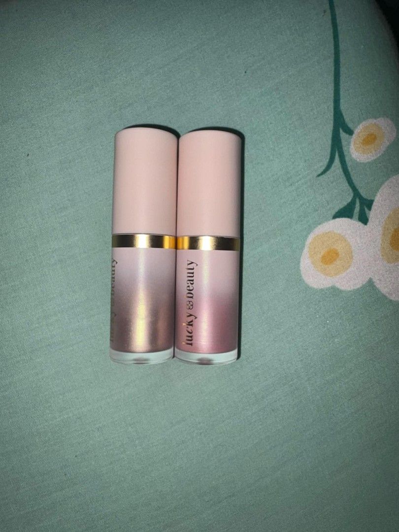 Lucky Beauty liquid highlighter (Category: Makeup) located in Manila. Submitted by cj_dreamshop (Listing ID 1460075985, Image 1). Description: 100 po dalawa na, ang color po niya ay rose quartz and citrine. Isang beses ko lang nagamit for swatching lang po..