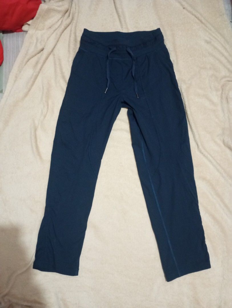 Lulemon mid-rise drawstring athletic pants size 2 170/58Y (Category: Other Bottoms) located in Las Pinas. Submitted by kaswakto (Listing ID 1459943759, Image 1). Description: 〽️ Lulemon mid-rise drawstring athletic pants in true navy blue. They showcase a straight or slightly tapered leg cut, vertical seam paneling along the front, and an elasticated waistband with an adjustable external drawcord. 〽️ Dimensions: 33 inches length x 13-15 inches/ 2