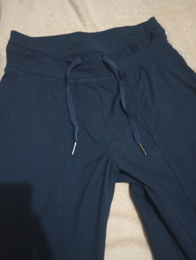 Lulemon mid-rise drawstring athletic pants size 2 170/58Y (Category: Other Bottoms) located in Las Pinas. Submitted by kaswakto (Listing ID 1459943759, Image 2). Description: 〽️ Lulemon mid-rise drawstring athletic pants in true navy blue. They showcase a straight or slightly tapered leg cut, vertical seam paneling along the front, and an elasticated waistband with an adjustable external drawcord. 〽️ Dimensions: 33 inches length x 13-15 inches/ 2
